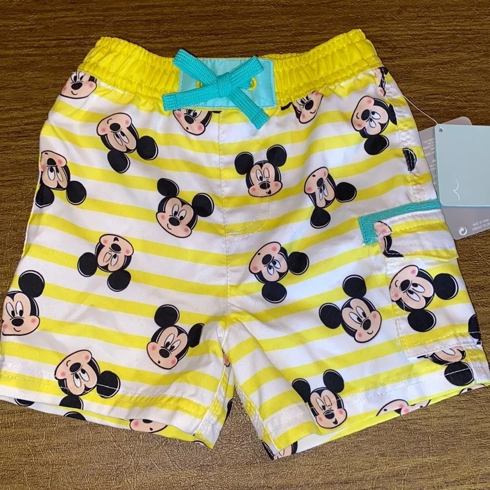 NWT Disney swim trunks size 9-12M